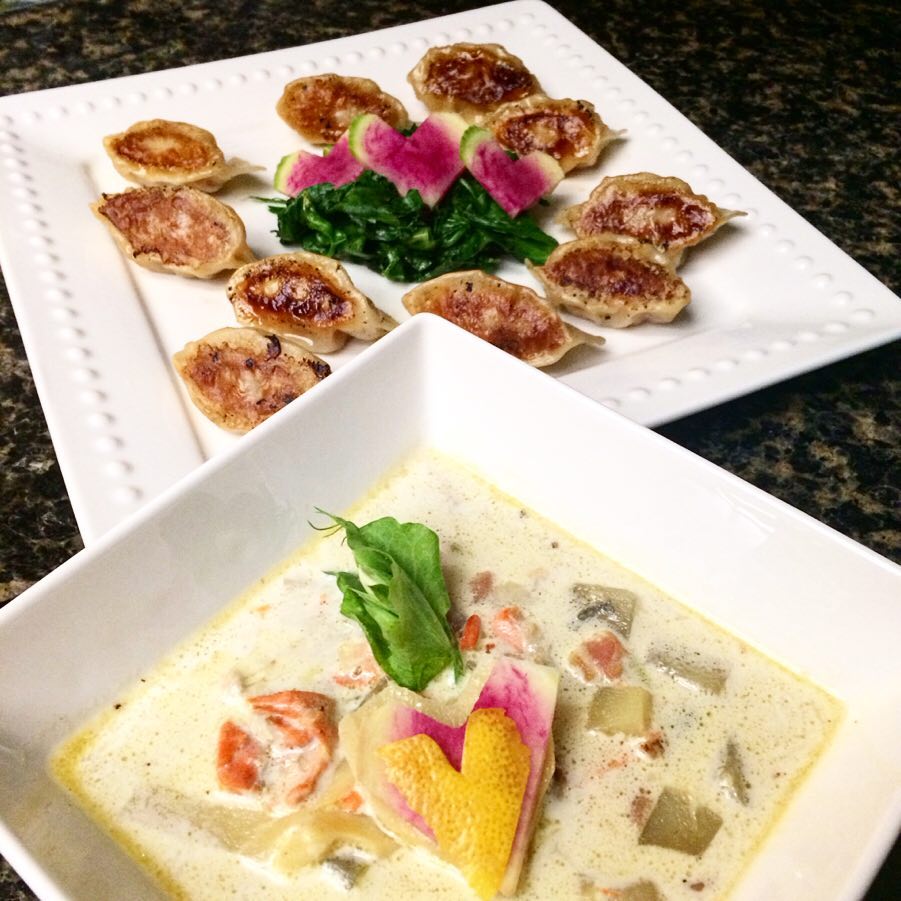Photo of two plates of food decorated with heart-shaped foods